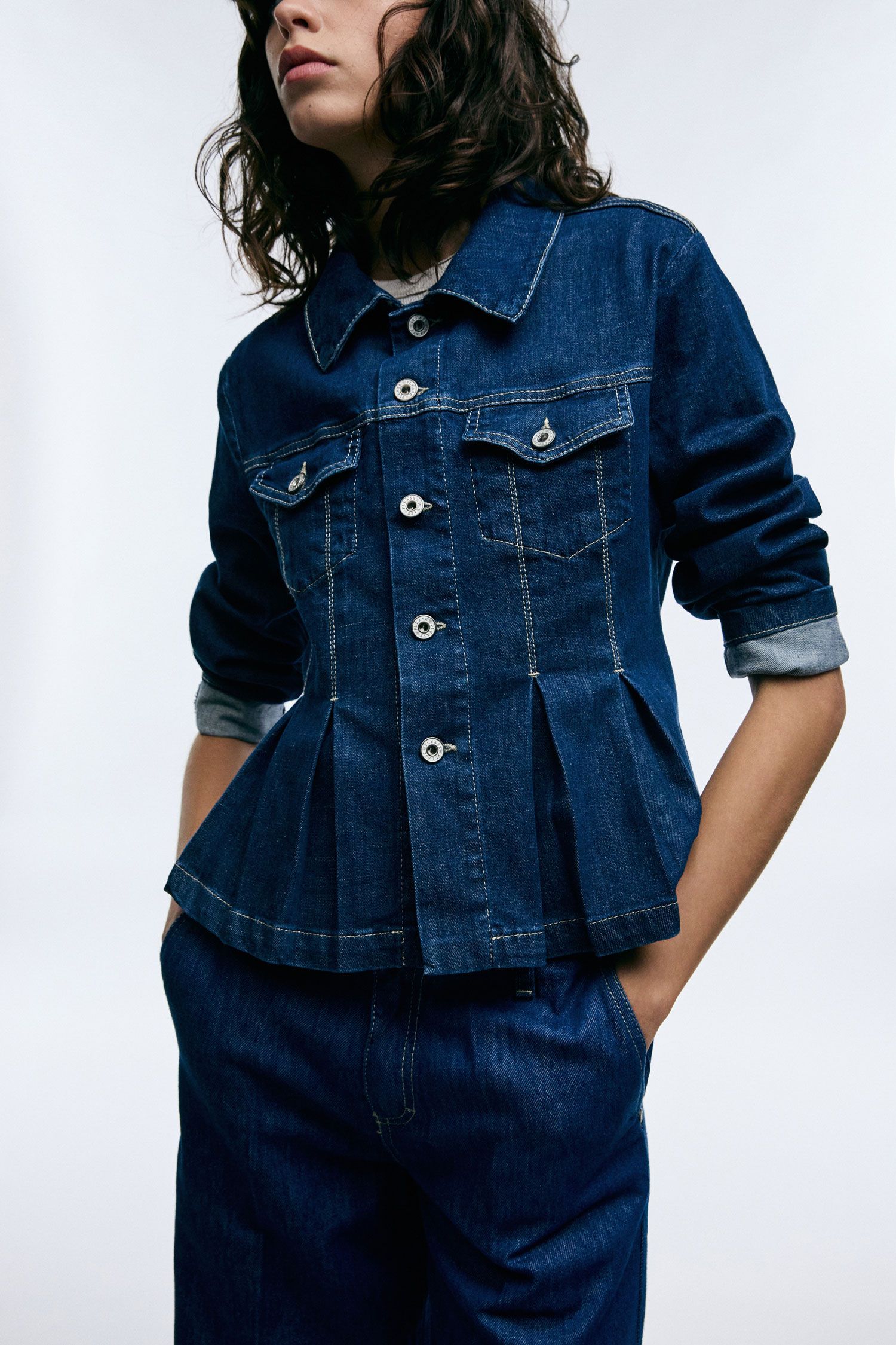 Denim jacket with pleats