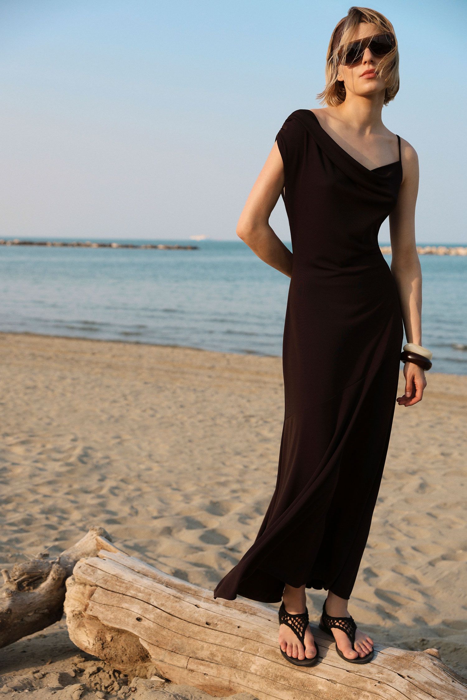 Long dress with asymmetrical neckline