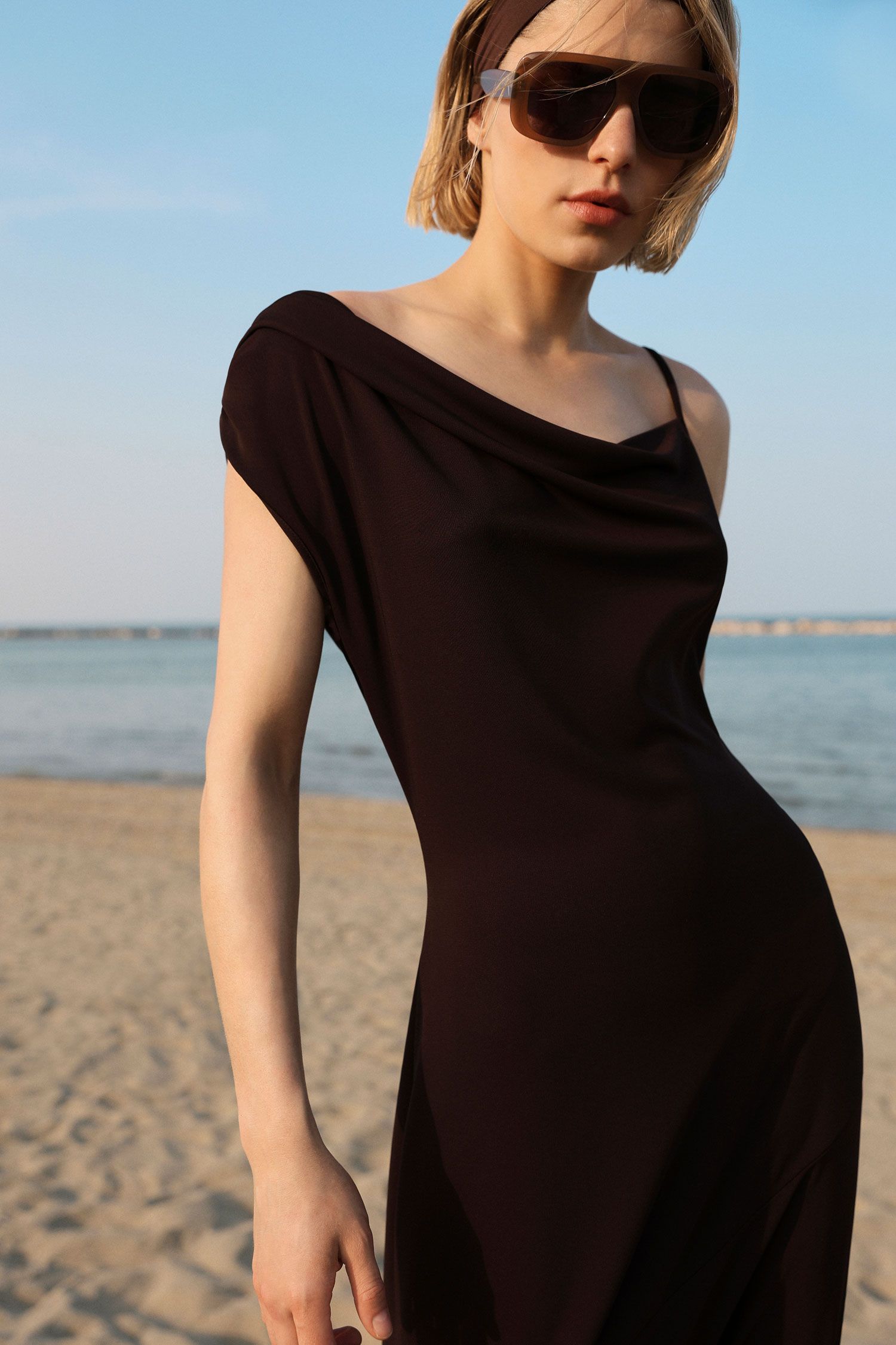 Long dress with asymmetrical neckline