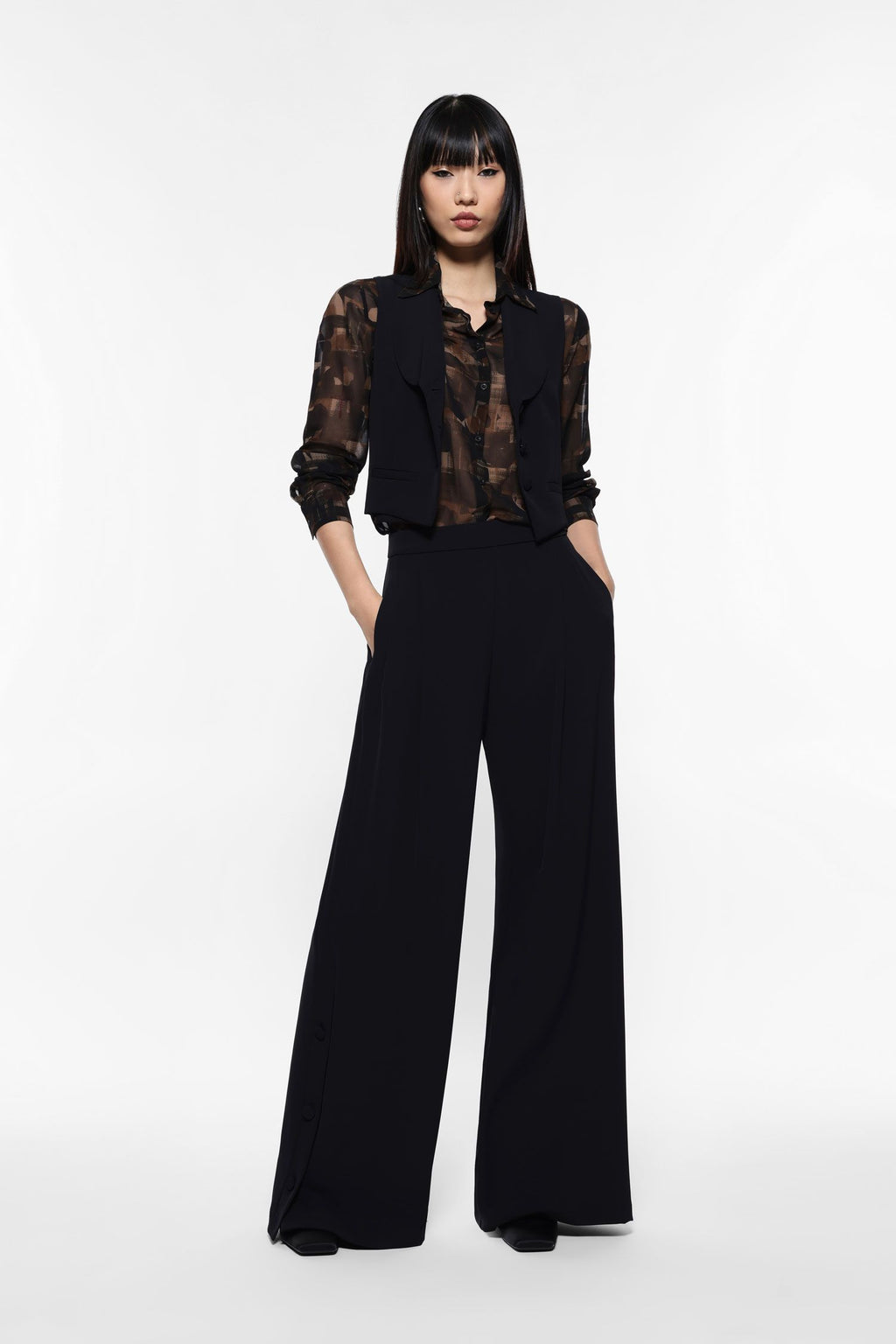 Wide-leg trousers with side buttons