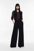 Wide-leg trousers with side buttons