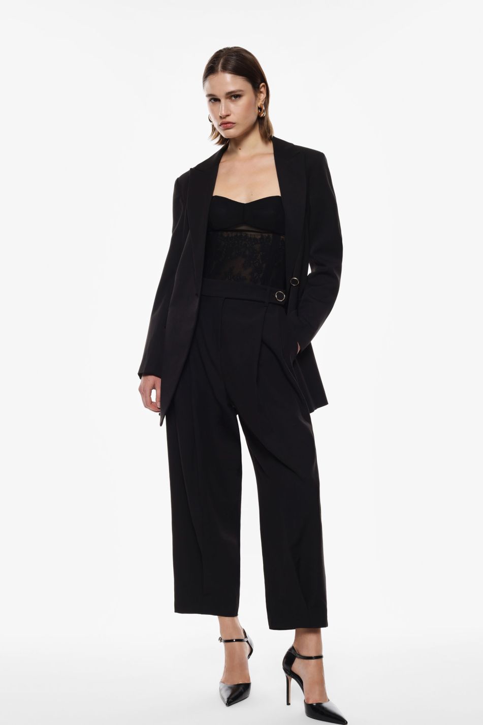 Trousers with pleats