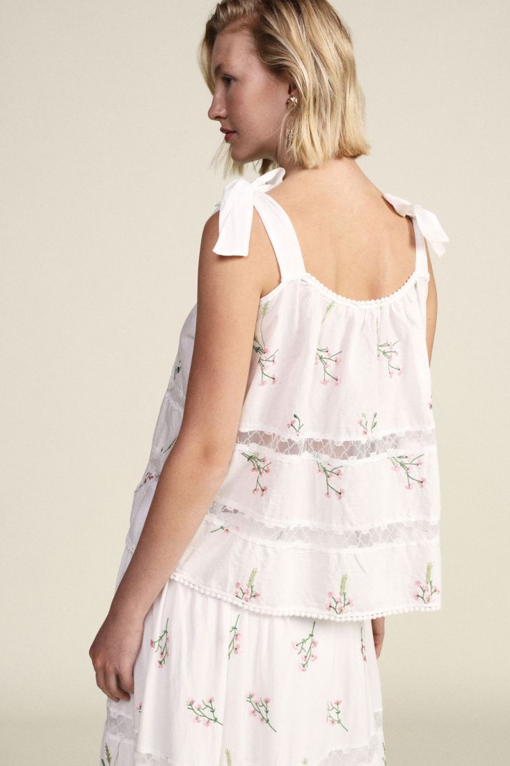 Top with floral embroidery