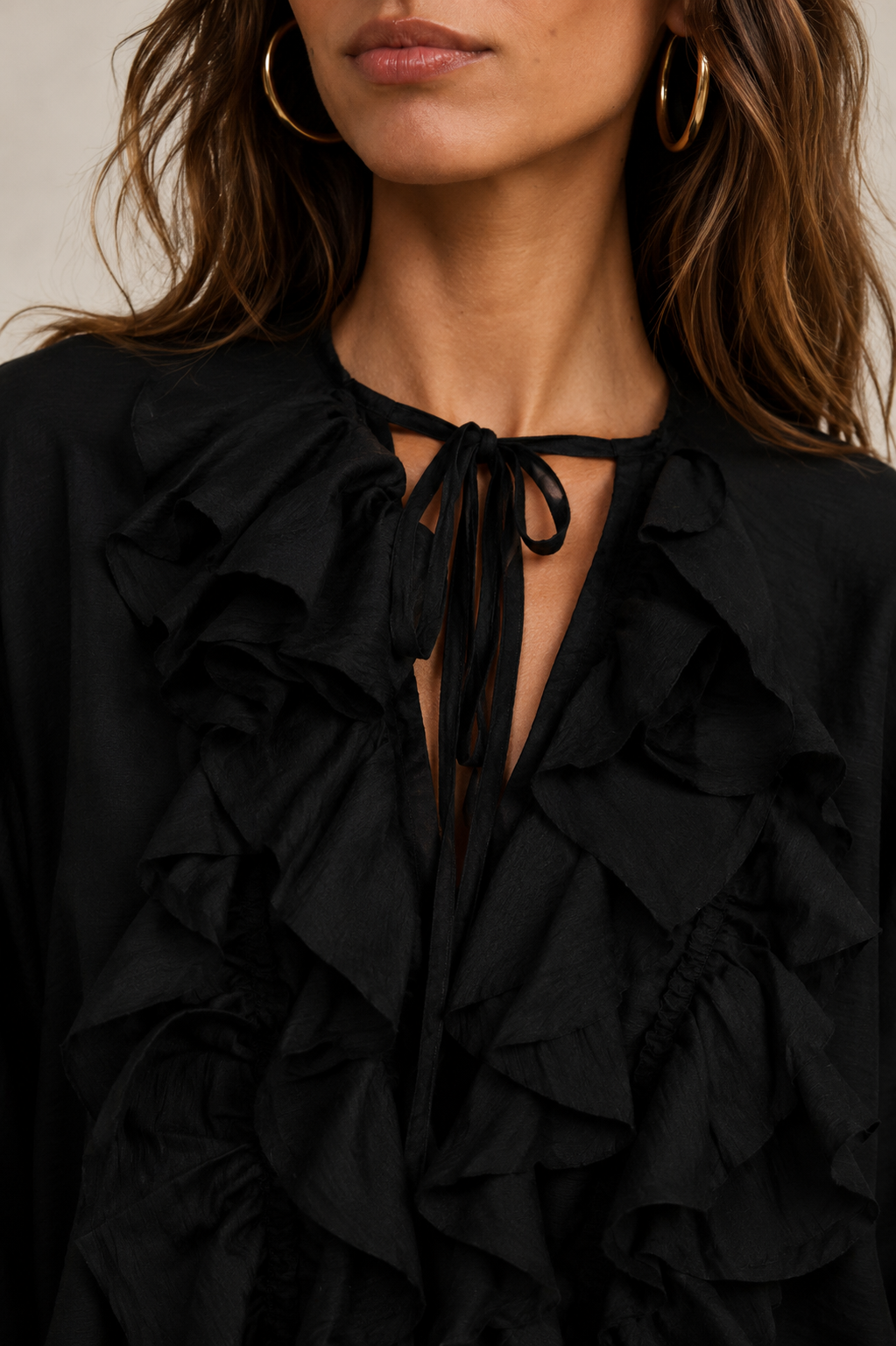 Blouse with front ruffle