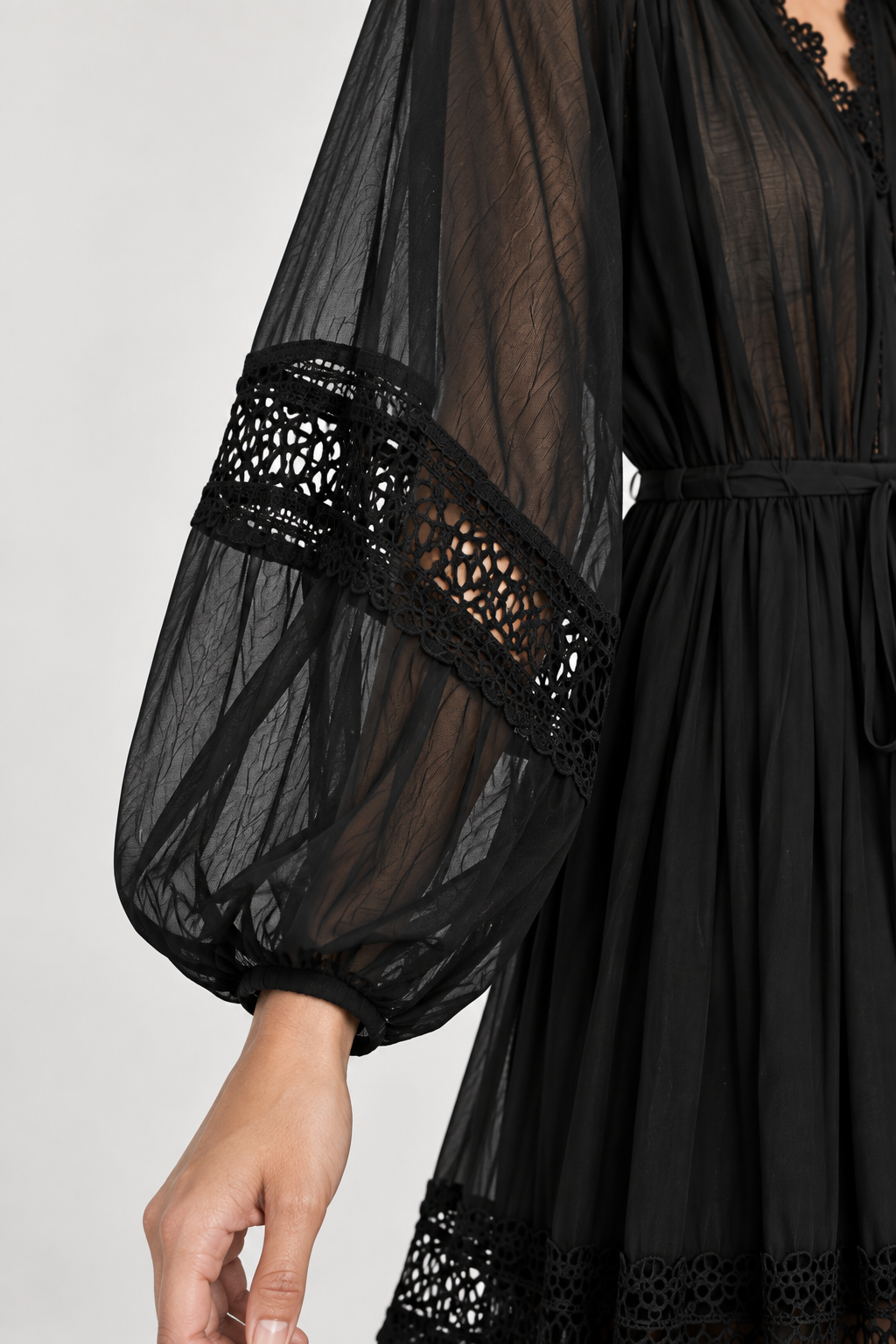 Dress with eyelet details