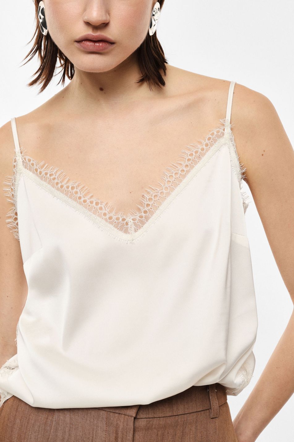 Top with thin straps and lace trim